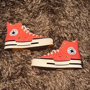 Converse High-Top Sneakers in Coral